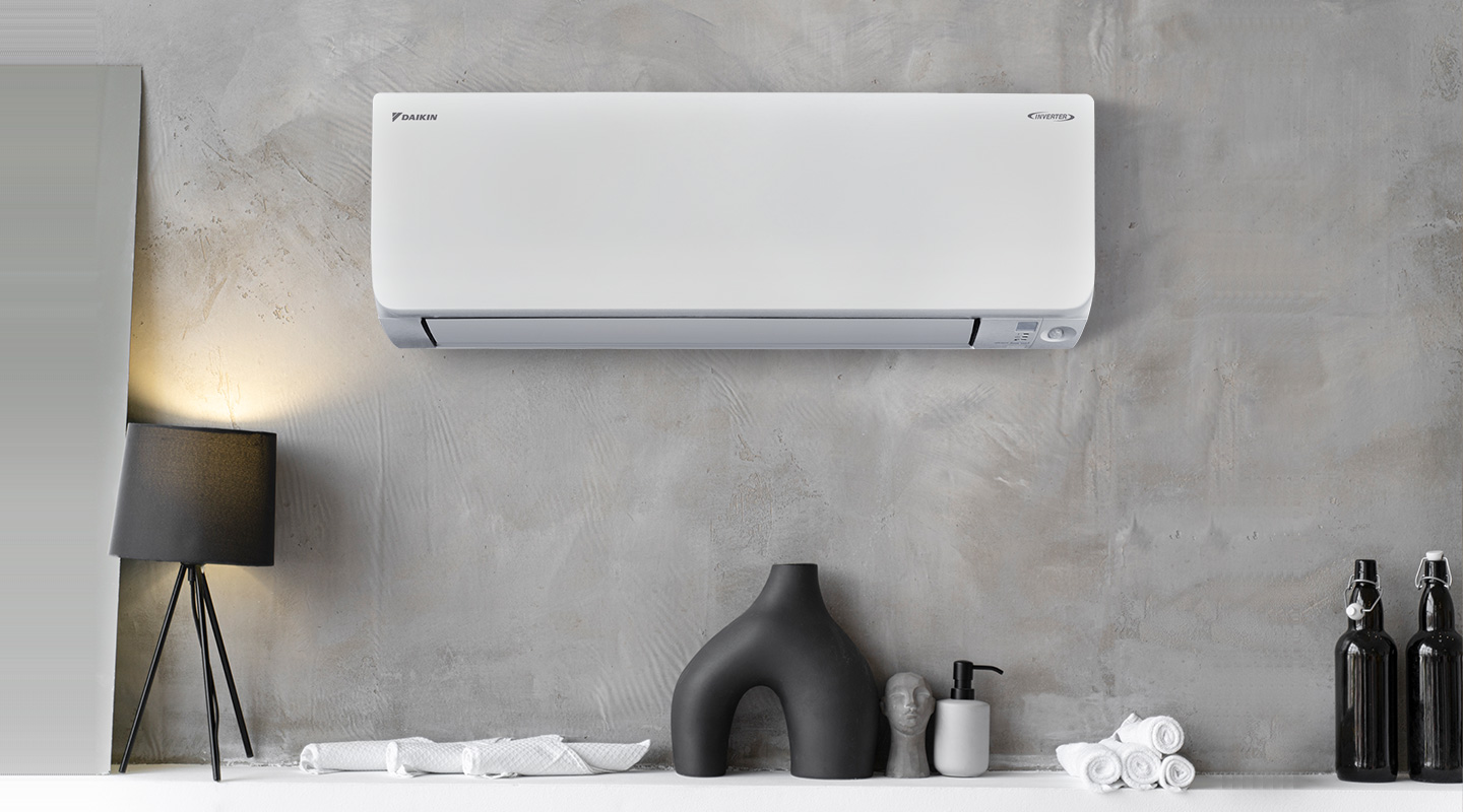 Installation climatisation réversible Daikin maison Bruxelles